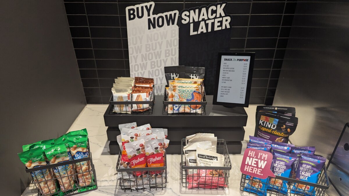WAND 7-inch smart label showing a snack price list on a grab-and-go snack display